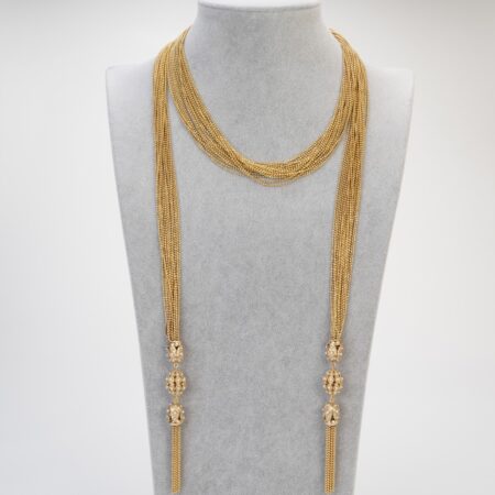 Collana Lunga Trasformabile: Sciarpa di Perle Dorate